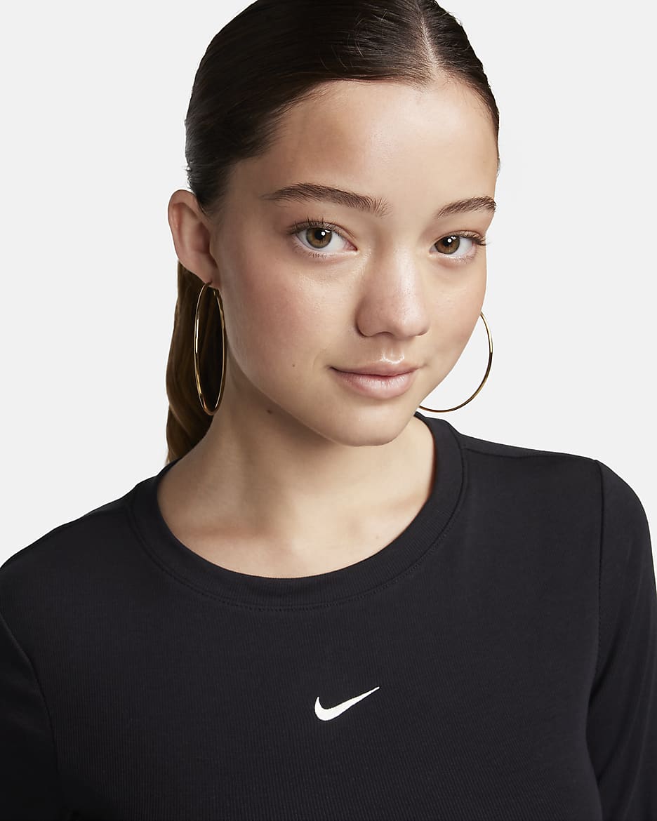 Nike Sportswear Essential Women s Ribbed Long Sleeve Mod Crop Top. Nike